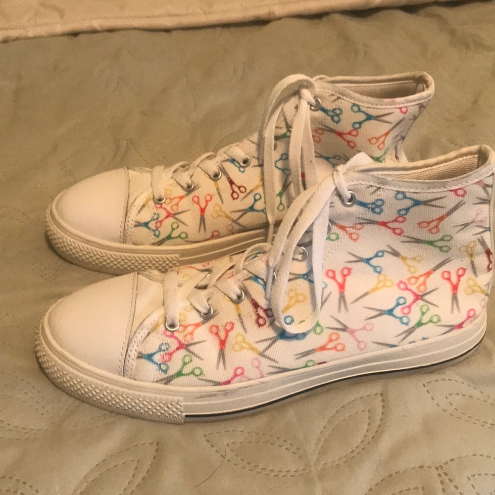 Women’s high top tennis shoes. Worn just once.